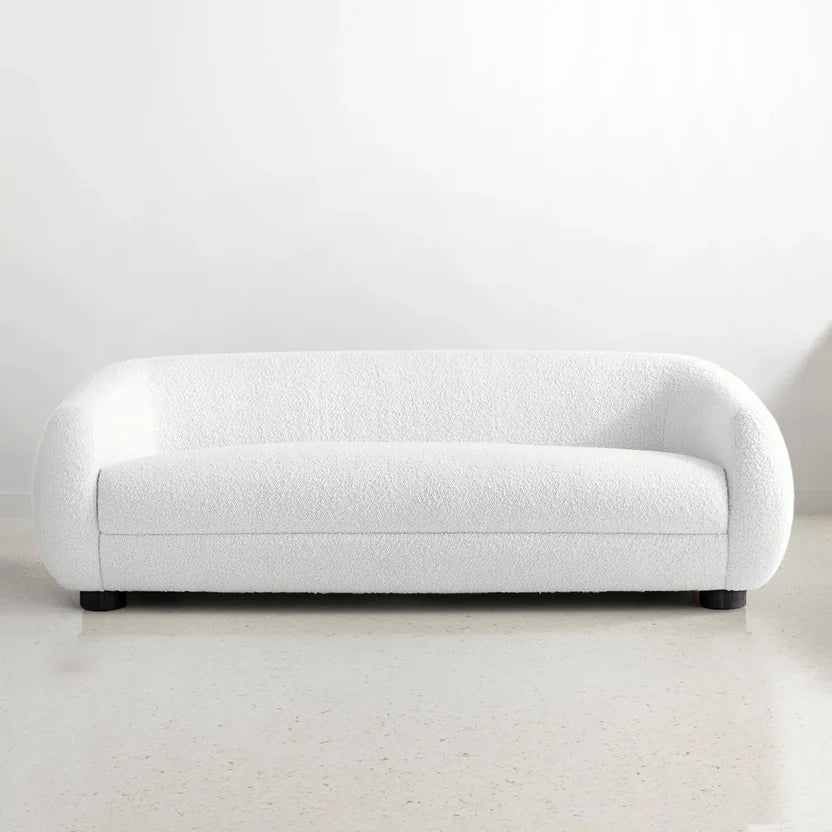 Experience Modern Luxury with the Curvy 4-Seater Boucle Couch — a statement piece designed to elevate any living space.