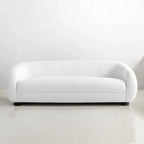 Experience Modern Luxury with the Curvy 4-Seater Boucle Couch — a statement piece designed to elevate any living space.