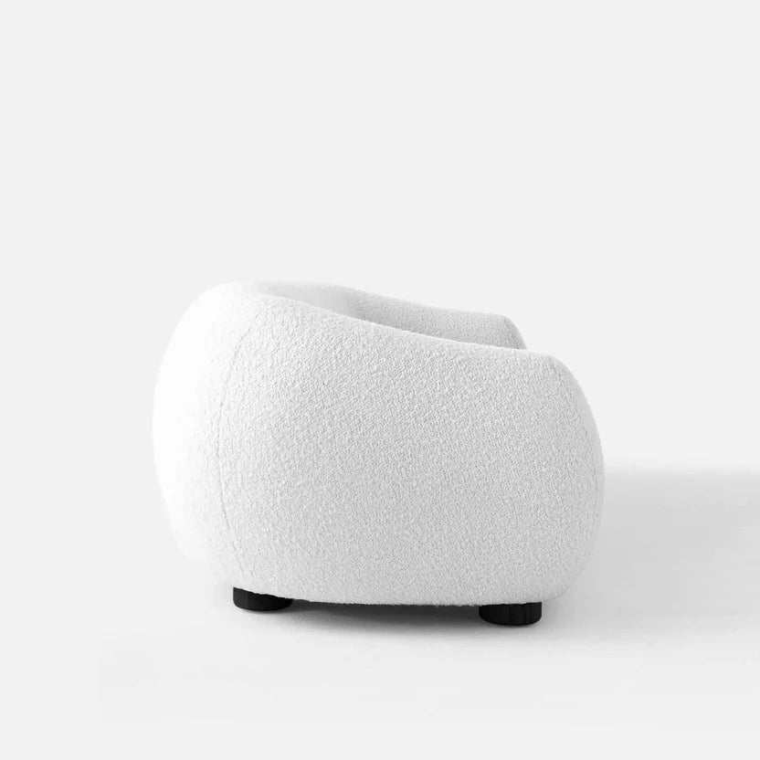 Experience Modern Luxury with the Curvy 4-Seater Boucle Couch — a statement piece designed to elevate any living space.